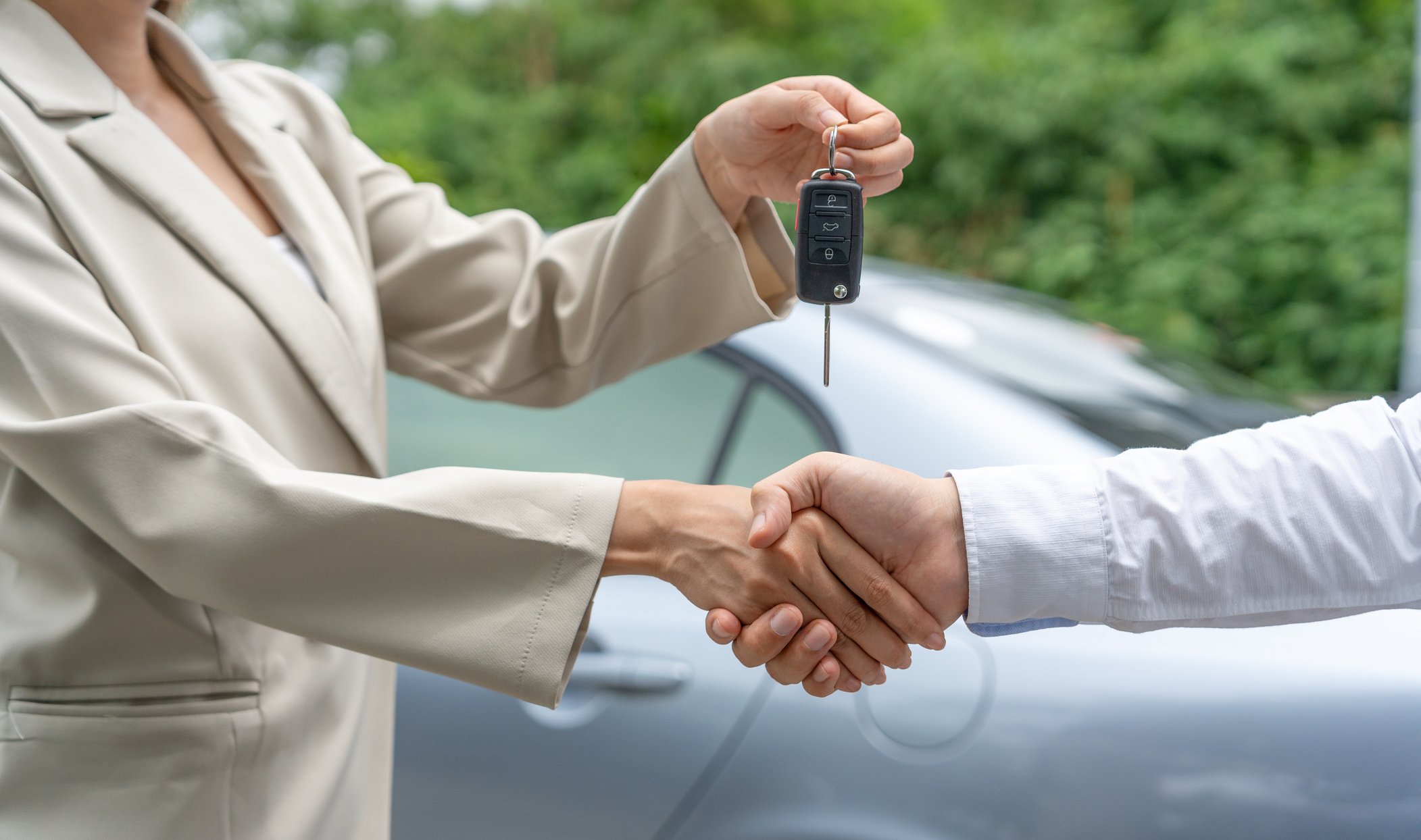 lease, rental car, sell, buy. Dealership manager send car keys t